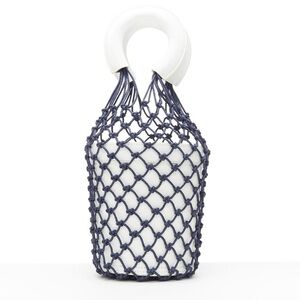Staud Moreau white bucket bag with black net